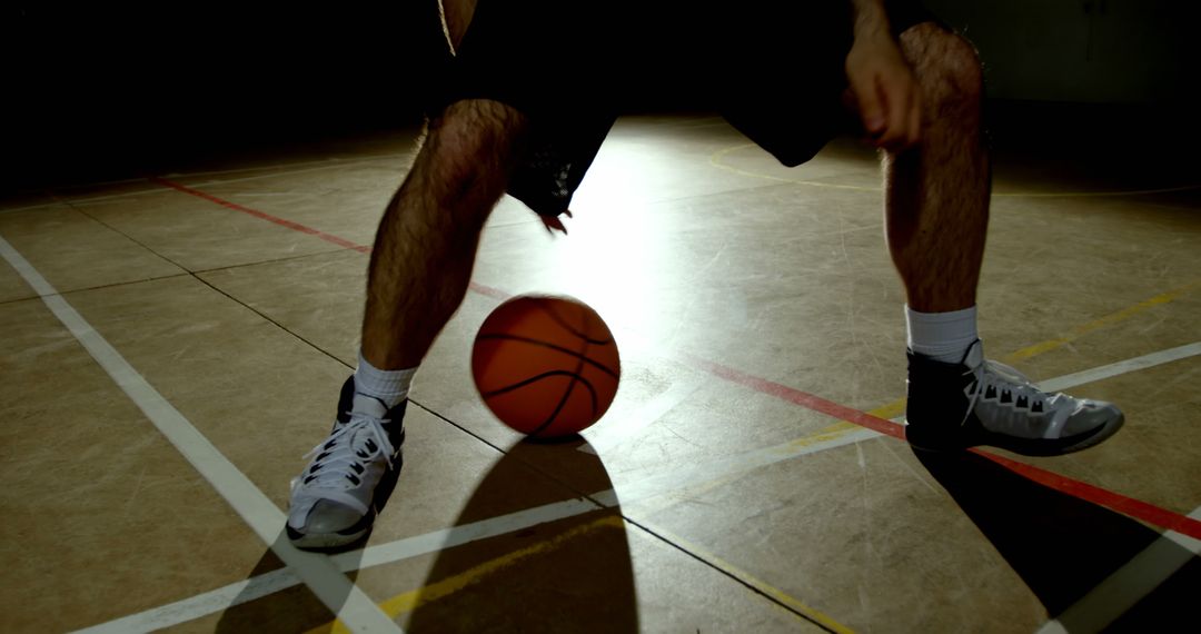 Intense Basketball Dribble in Action-Packed Game Moment