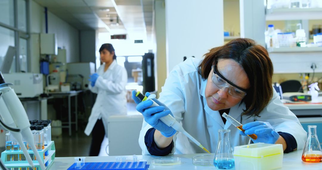 Caucasian woman conducts research in a lab - Free Images, Stock Photos and Pictures on Pikwizard.com