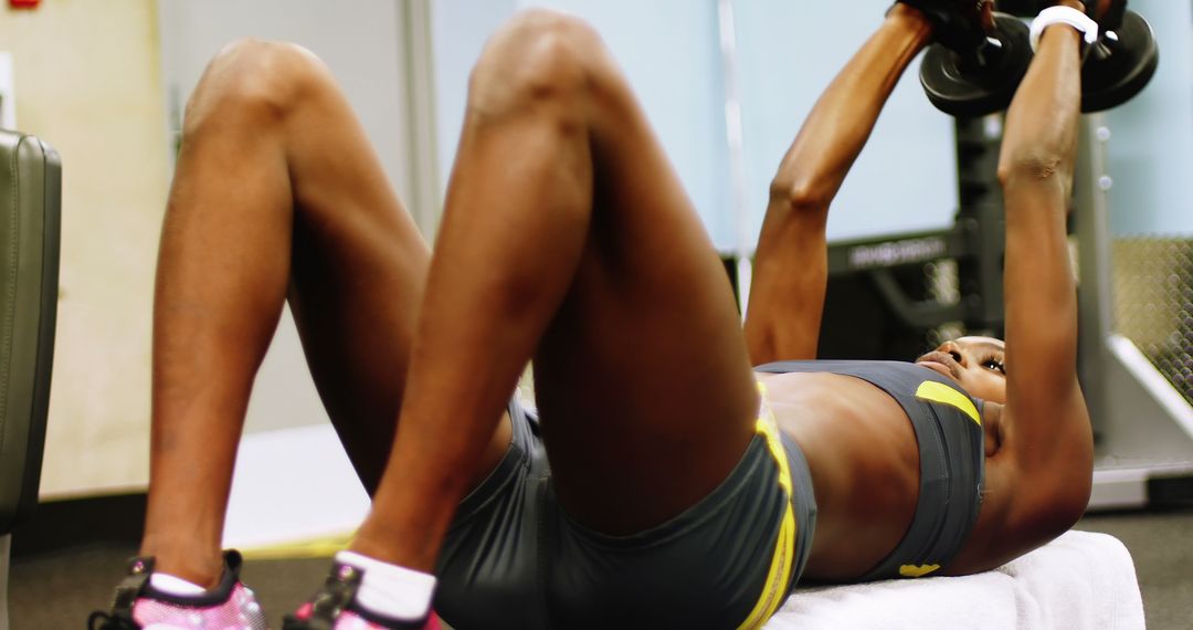 A dedicated African American woman works out her abs in a gym with room for text. - Free Images, Stock Photos and Pictures on Pikwizard.com