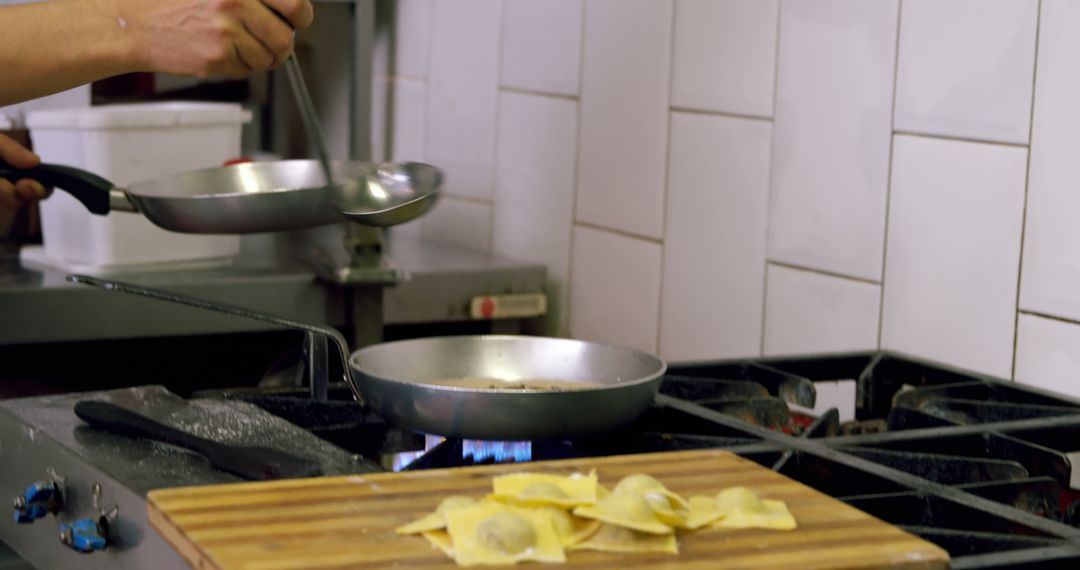 Cooking Ravioli on Professional Kitchen Stove - Free Images, Stock Photos and Pictures on Pikwizard.com