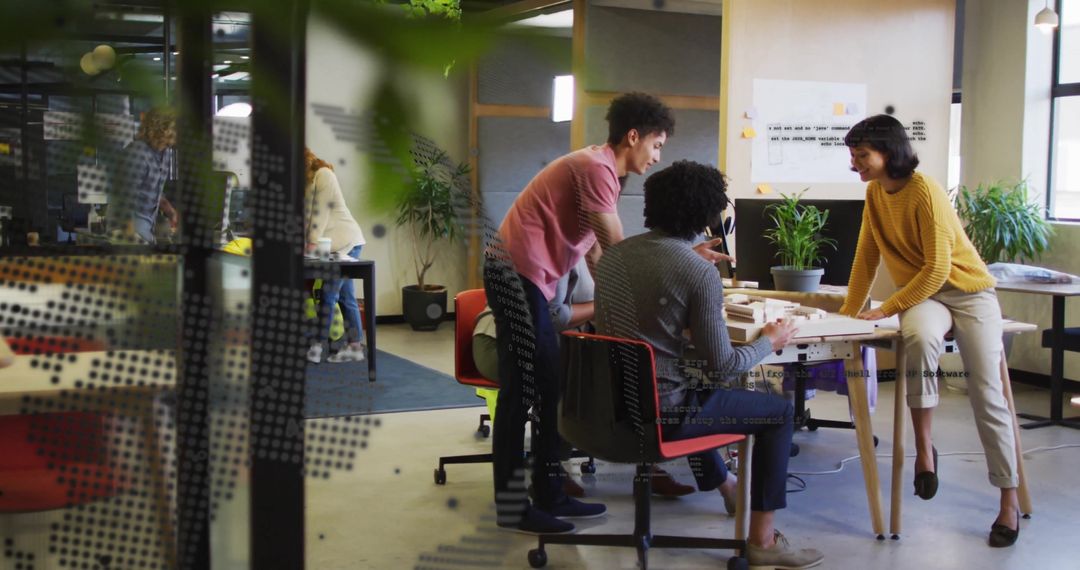 Diverse Business Team Collaborating in Modern Office Workspace