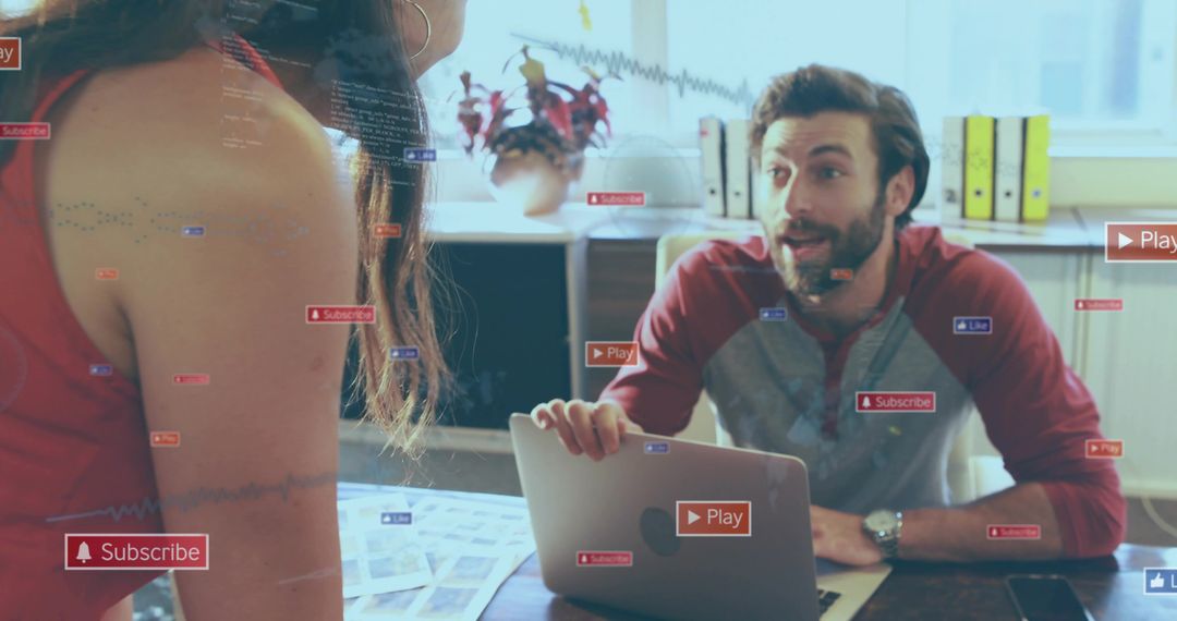 Team Collaborating in Modern Office with Interactive Media