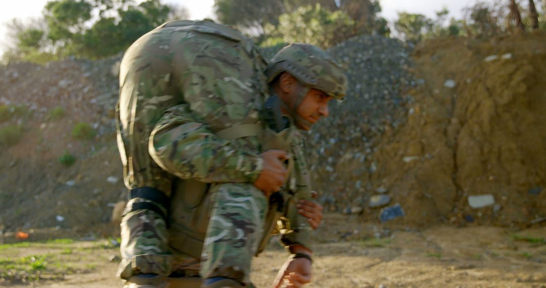 Military Soldiers in Training, Carrying Injured Comrade