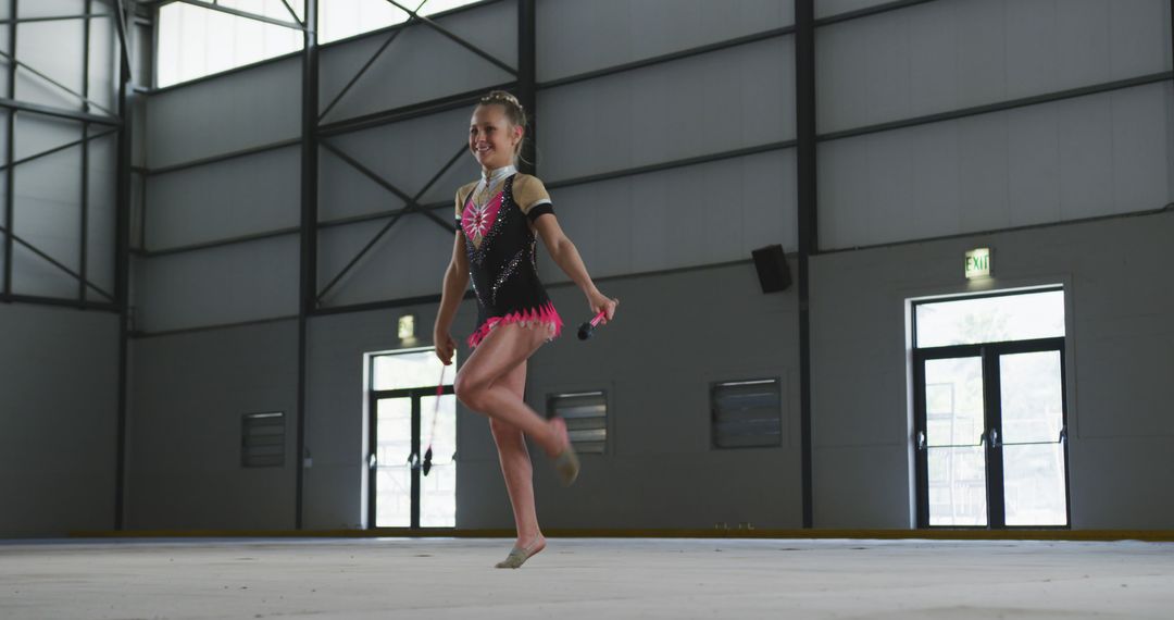 Young Gymnast Practicing Routine in Gymnasium - Free Images, Stock Photos and Pictures on Pikwizard.com