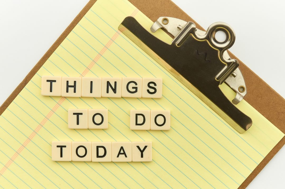Things to Do Today Organized on Notepad with Clipboard