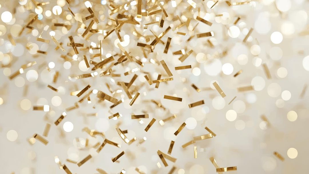 Cascading Gold Confetti with Sparkling Bokeh Lights