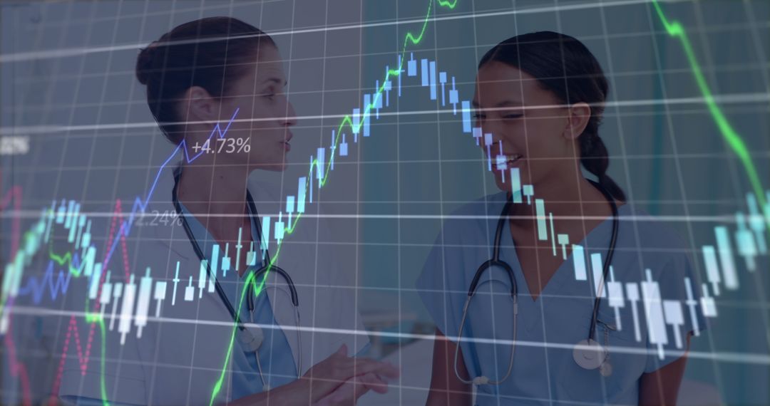 Medical Professionals Discussing Data Overlaid with Financial Graphs - Free Images, Stock Photos and Pictures on Pikwizard.com