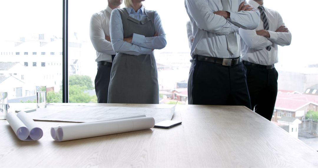 Group of Business Professionals Standing with Arms Crossed in Office - Free Images, Stock Photos and Pictures on Pikwizard.com