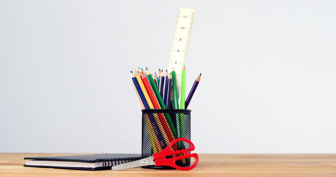 Organized Desk with Colored Pencils and School Supplies - Free Images, Stock Photos and Pictures on Pikwizard.com