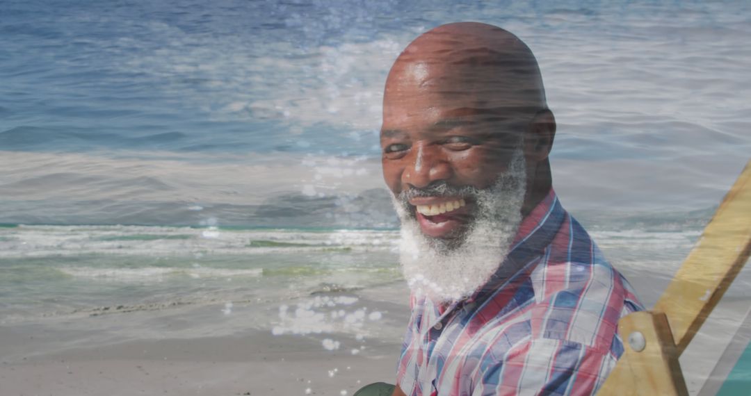 Smiling Man Relaxing on Seaside Beach Chair - Free Images, Stock Photos and Pictures on Pikwizard.com