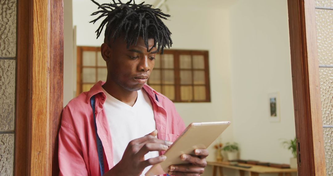 Young Artisan Using Tablet in Workshop for Creative Designs