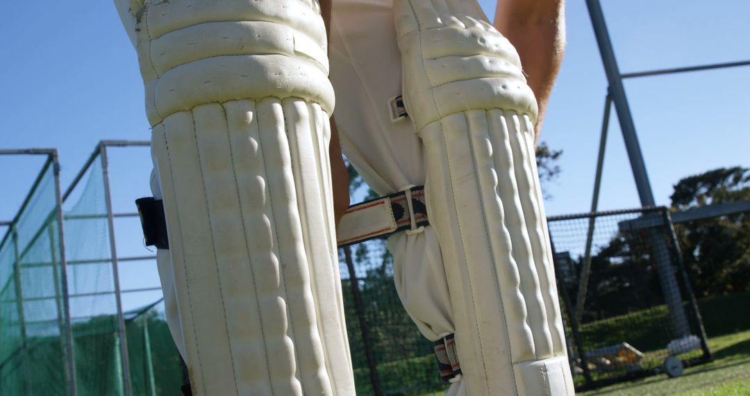 Close-Up of Cricketer Wearing Leg Pads at Training Ground - Free Images, Stock Photos and Pictures on Pikwizard.com