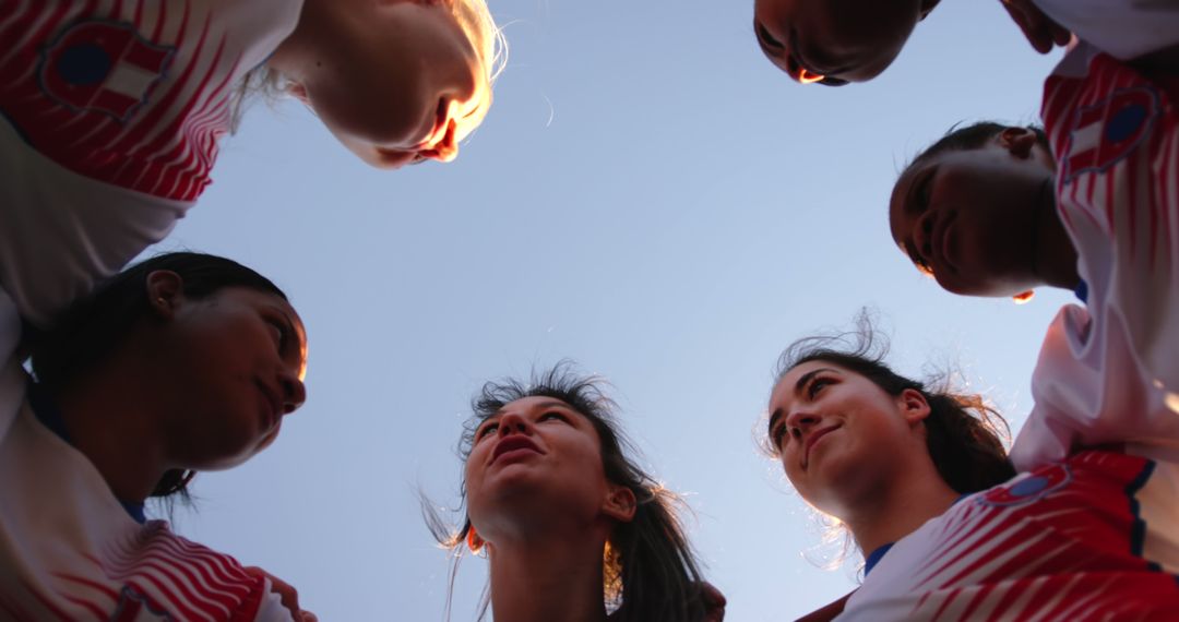 Low Angle View of Female Soccer Team in Huddle Before Game - Free Images, Stock Photos and Pictures on Pikwizard.com