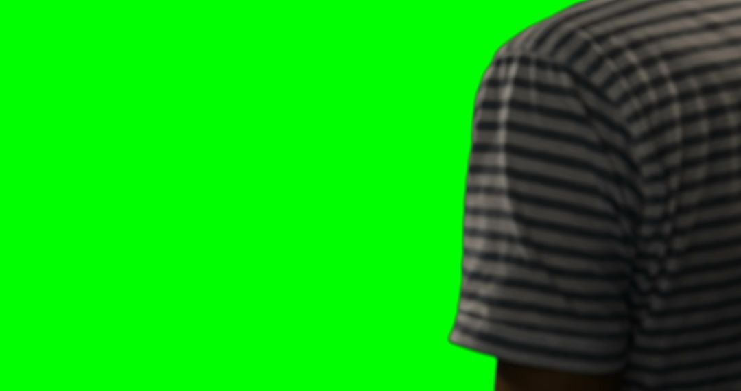 Person Wearing Striped Shirt with Green Screen Background - Free Images, Stock Photos and Pictures on Pikwizard.com