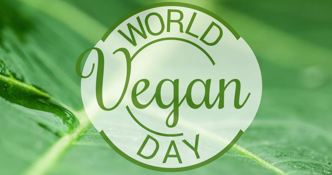 World Vegan Day Concept Text with Green Leafs Background