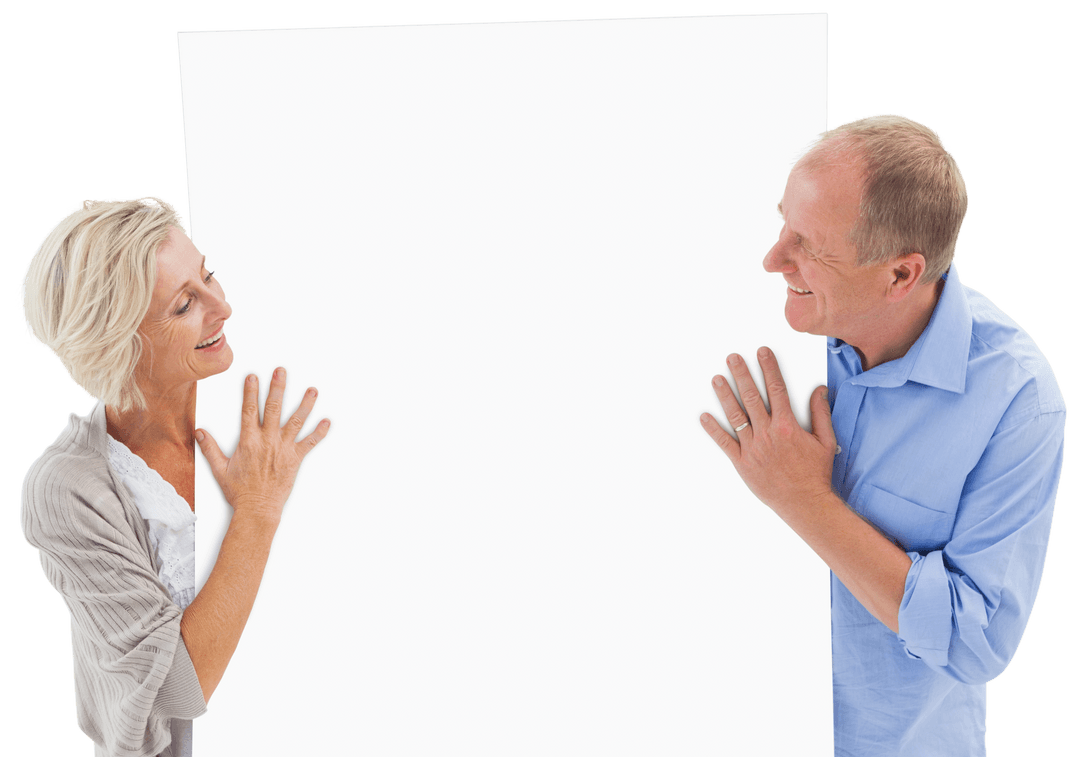 Smiling Mature Couple Holding a Large Transparent Card
