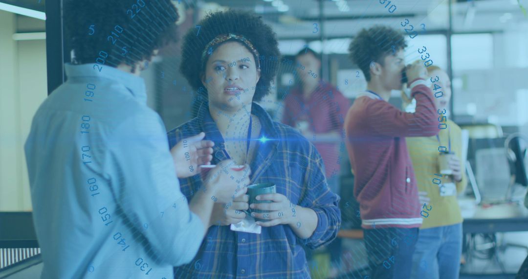 People Socializing in Modern Office with Technology Overlay