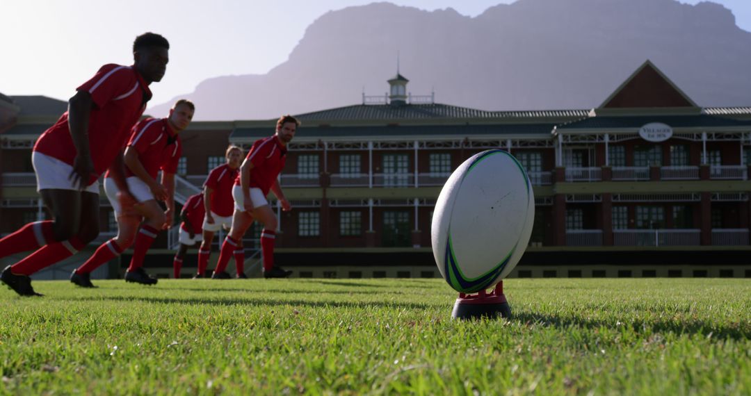 Rugby Team Preparing for Kickoff on Field with Mountain in Background - Free Images, Stock Photos and Pictures on Pikwizard.com