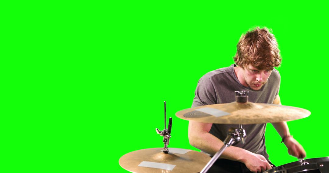 Young Drummer Performing on Drum Kit with Green Screen Background - Free Images, Stock Photos and Pictures on Pikwizard.com