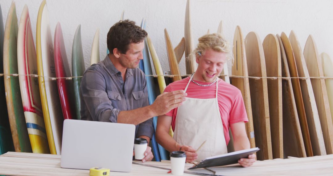 Surfboard Makers Collaborating in Workshop on Business Strategy