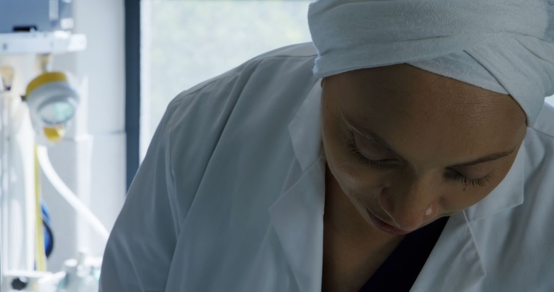 Female Scientist Working in Laboratory with Concentration - Free Images, Stock Photos and Pictures on Pikwizard.com