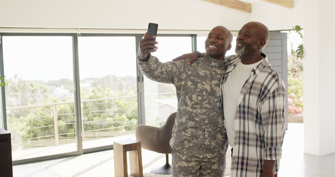 Soldier in Uniform with Father Taking Selfie During Homecoming
