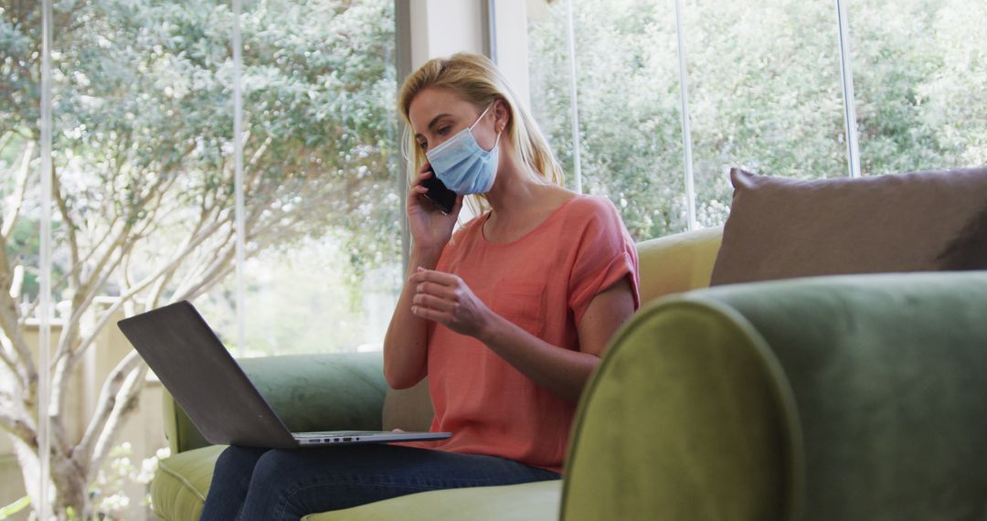 Woman Working from Home Wearing Protective Face Mask - Free Images, Stock Photos and Pictures on Pikwizard.com