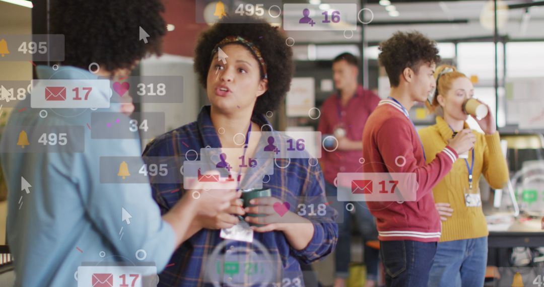 Diverse Team Discussing with Digital Notifications During Office Break