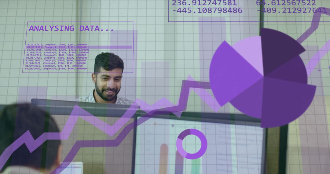 Data Analyst Using Dual Monitors Overlay Charts in Office