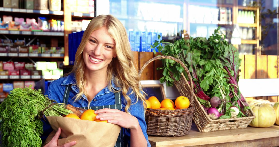 Woman Smiling with Fresh Vegetables in Market - Free Images, Stock Photos and Pictures on Pikwizard.com