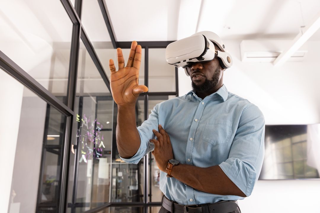 Professional Engaged in Interactive VR Experience in Modern Office