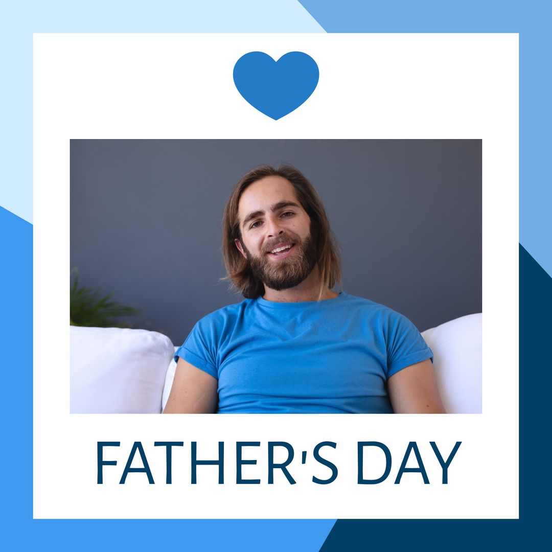 Smiling Caucasian Father on Sofa for Father's Day
