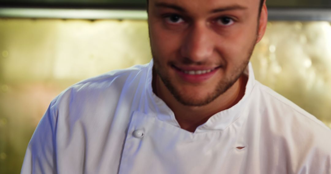 Smiling Male Chef in Professional Kitchen - Free Images, Stock Photos and Pictures on Pikwizard.com