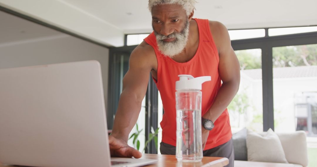 Image of african american senior man practicing at home - Free Images, Stock Photos and Pictures on Pikwizard.com