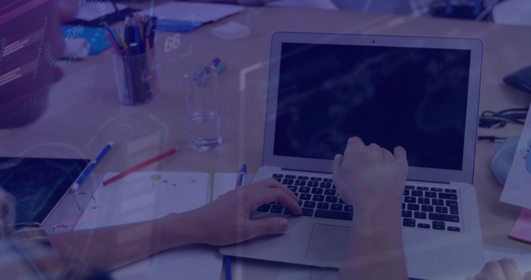Professional Typing with Laptop in Casual Open Plan Office Workspace
