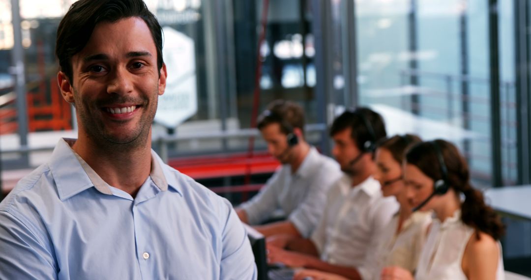 Confident Manager with Team Working in Call Center - Free Images, Stock Photos and Pictures on Pikwizard.com