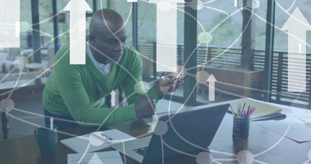 Businessman Analyzing Data Trends with Global Connections Overlay