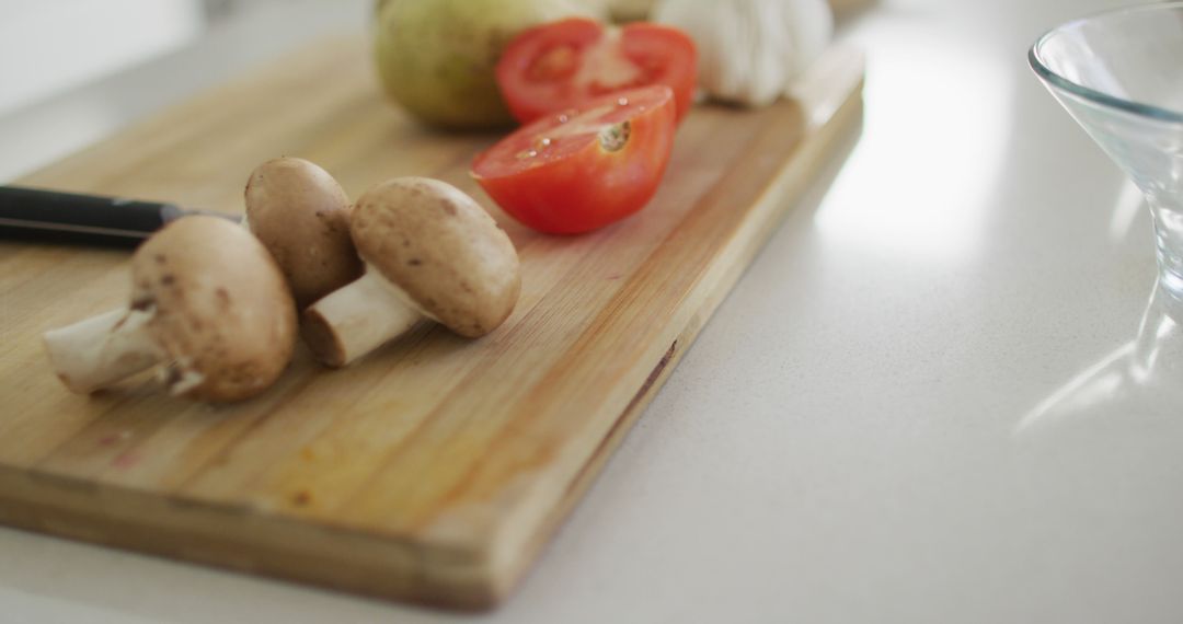 Fresh Vegetables on Cutting Board in Modern Kitchen - Free Images, Stock Photos and Pictures on Pikwizard.com