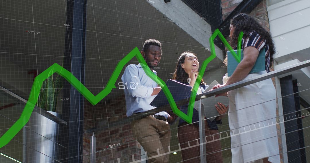 Diverse Team Discussing Growth Charts in Modern Office - Free Images, Stock Photos and Pictures on Pikwizard.com