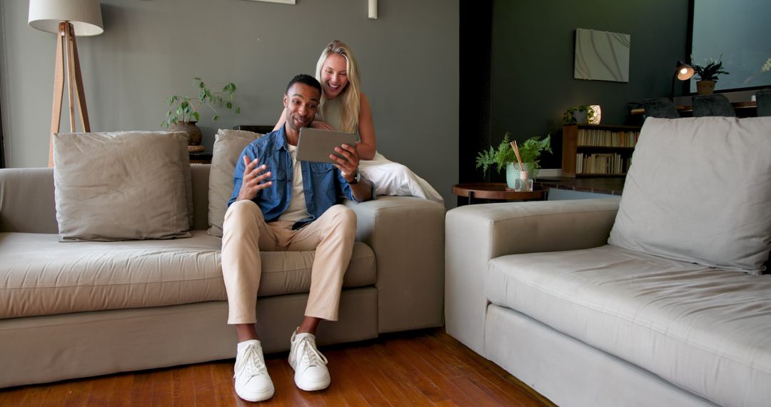 Couple Celebrating Engagement via Video Call at Home