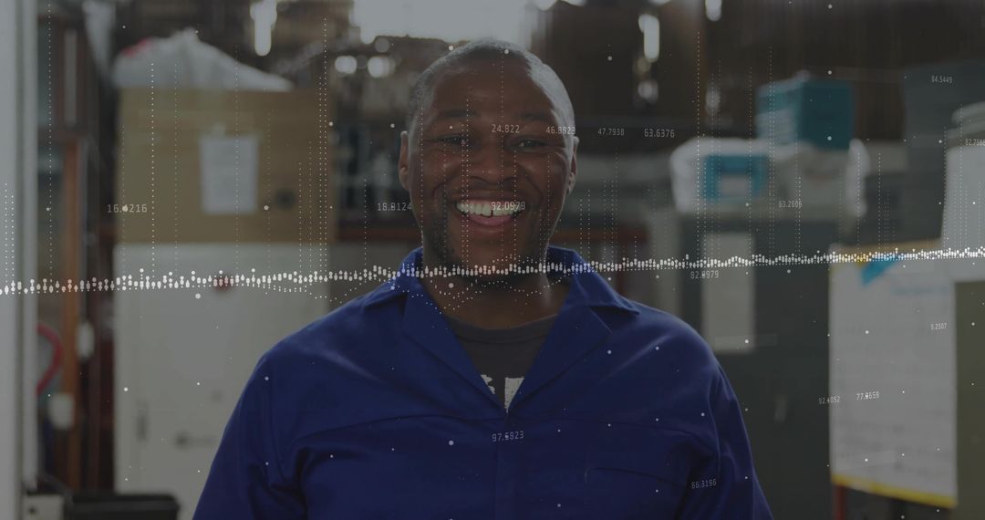 Smiling Warehouse Worker with Data Overlay in Industrial Environment