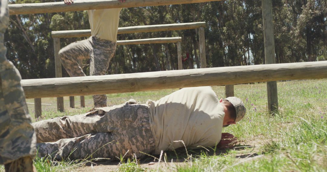 Soldiers Tackling Obstacle Course in Boot Camp Training