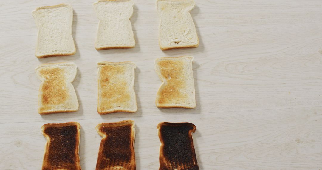 Variety of Toasted Bread Slices on Wooden Surface