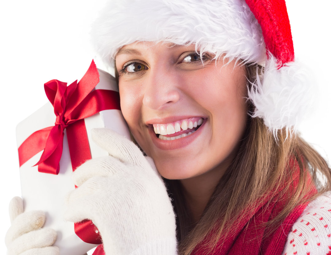 Woman with Christmas Gift in Santa Hat Smiling, Transparent Background - Download Free Stock Images Pikwizard.com