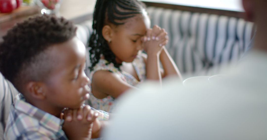 Children Praying Together at Family Meal - Free Images, Stock Photos and Pictures on Pikwizard.com