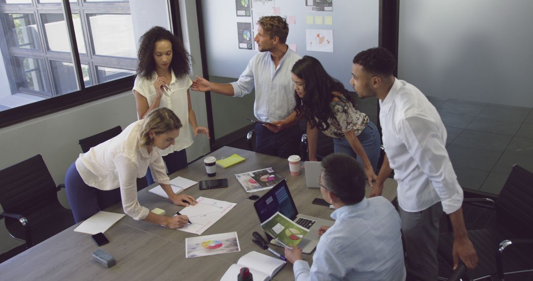 Dynamic Business Team Collaborating in Modern Office
