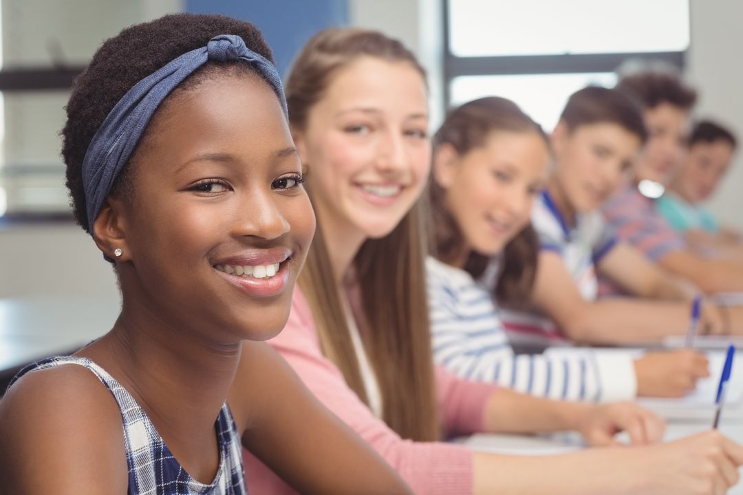 Diverse Students Smiling in Classroom - Free Images, Stock Photos and Pictures on Pikwizard.com