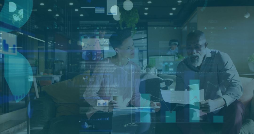 Collaborating on Business Data in Modern Office Lounge