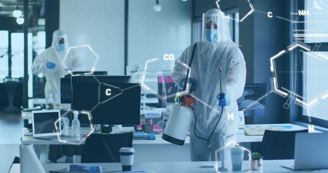 Diverse Team Disinfecting Office in Protective Gear