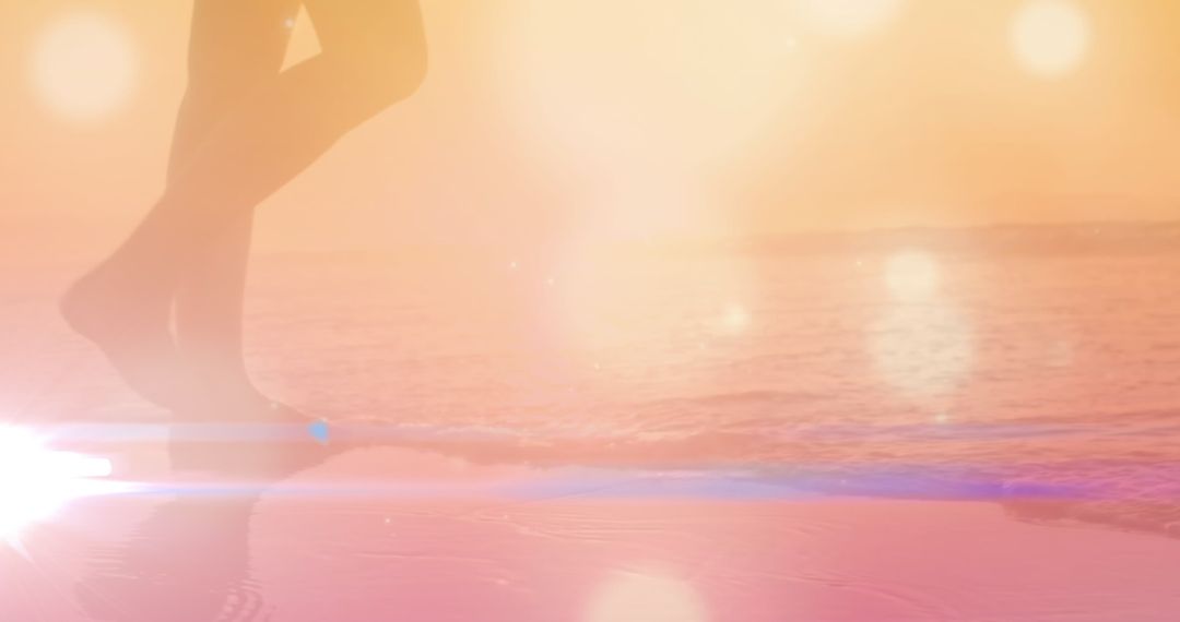 Ethereal beach scene with soft light and female silhouette